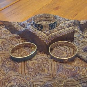 Three  Coach Blue and Sterling Silver bracelets.